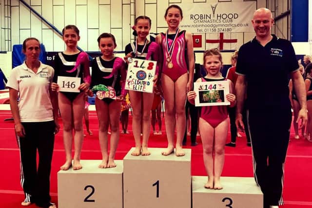 From left - coach Nicola James, Imogen Fletcher, Ebony Docherty, Mia-May Bovington, Lucie Andrews, Erin Banks, coach Edward Shields EMN-170806-160405002