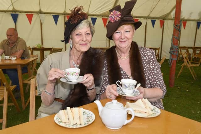 1940's event at Central Park, Boston. L-R Kathleen Elson of Mablethorpe and Pamela Ragg of Sutton-on-Sea enjoying a cup of tea. EMN-171206-123640001