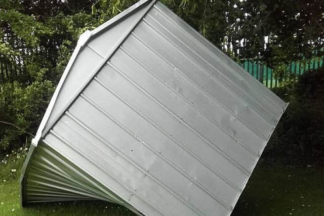 The smashed up shed left by vandals in Sleaford cemetery. EMN-171206-132500001