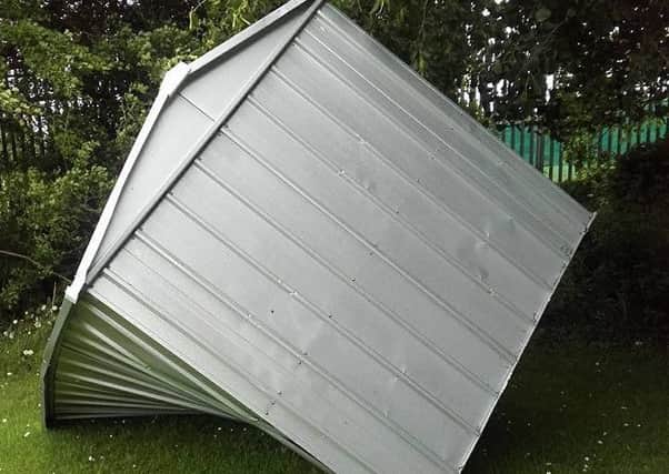 The smashed up shed left by vandals in Sleaford cemetery. EMN-171206-132500001