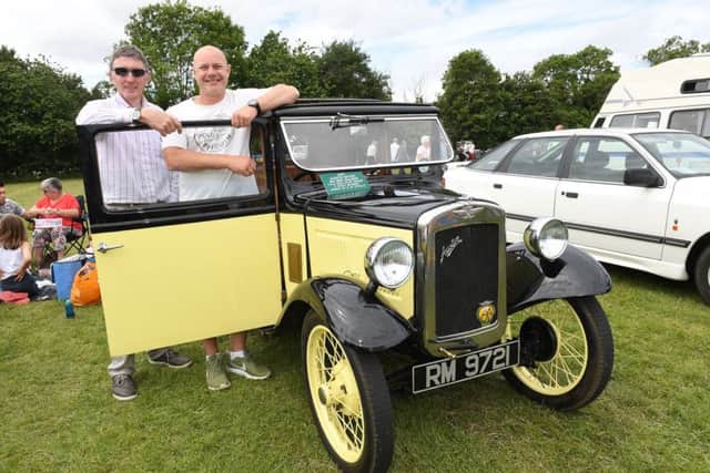 Friskney Show. L-R David Steels with his son-in-law Bill Howard of Candlesby, with David's 1933 Austin 7 Box Saloon. EMN-171206-153122001