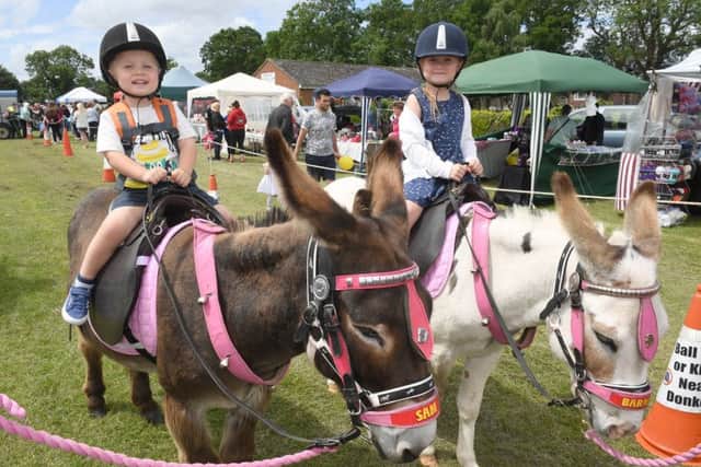 Friskney Show. Thomas Coutts 3 and Emily Coutts 6 of Wainfleet enjoying a donkey ride.