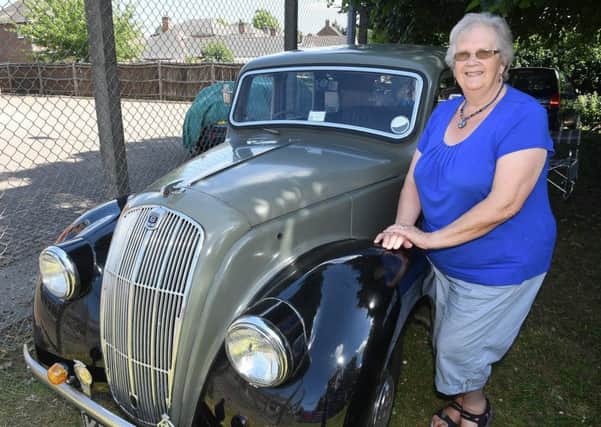 Marjorie Atkinson, of Great Hale, pictured exhibiting a Morris Eight at the weekend.