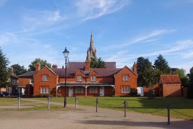 Heckington.village green, parish church and almshouses. EMN-170614-110138001