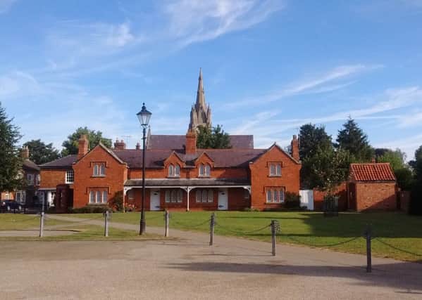 Heckington.village green, parish church and almshouses. EMN-170614-110138001