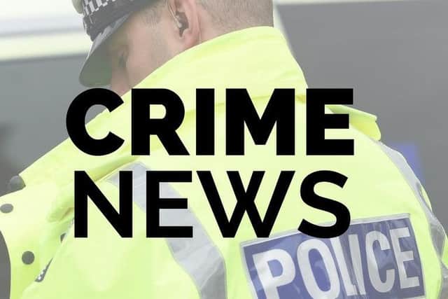 Burglars stole a gold watch from a Northamptonshire house by using a wheelie bin to gain entry.