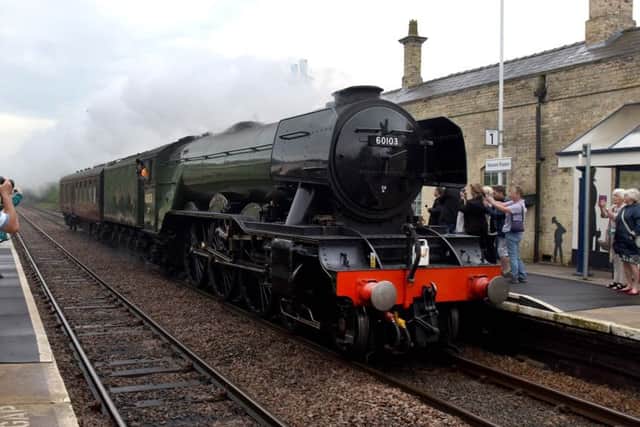 The Flying Scotsman passing through Market Rasen. EMN-170616-103432001