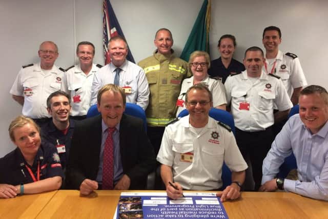 Cllr Nick Worth, executive councillor for emergency services at Lincolnshire County Council, Nick Borrill, chief fire officer at Lincolnshire Fire and Rescue and Ben Selby, brigade secretary at the FBU together with firefighters and senior managers from the Service.