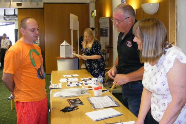 Talking to prospective employees at the SHD Composites stand during teh Careers Fair in Sleaford. EMN-170620-100508001