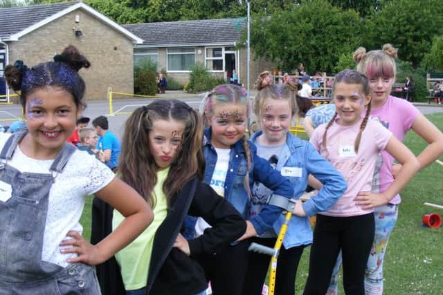 How to be a fashion icon. Girls did make up and hair with teacher Miss Marsh. From left - Eleanor, Rebecca, Eva, Isla, Katie and Charlotte at Cranwell Experience Day. EMN-170620-093420001