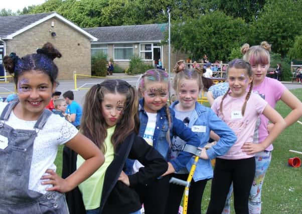 How to be a fashion icon. Girls did make up and hair with teacher Miss Marsh. From left - Eleanor, Rebecca, Eva, Isla, Katie and Charlotte at Cranwell Experience Day. EMN-170620-093420001