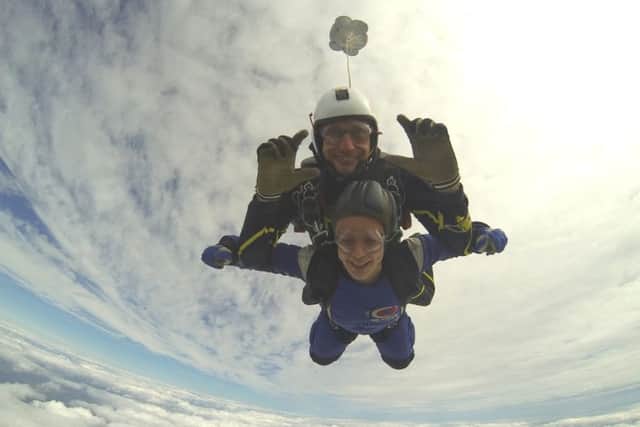 Jeni Lowe making her way back to the ground from 10,000ft with her instructor Neil.