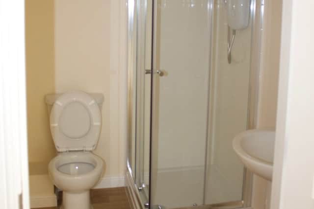 The downstairs WC/shower room within the downstairs extension in one of the properties in Newfield Road that has been revamped by NKDC. EMN-170622-085357001