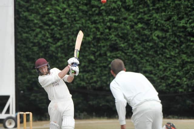 Tom White in action for Alford CC.