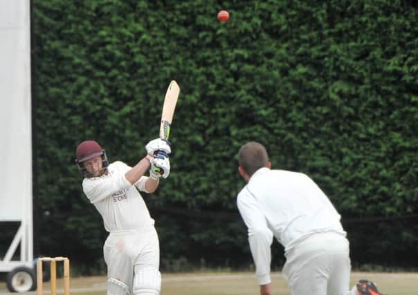 Tom White in action for Alford CC.