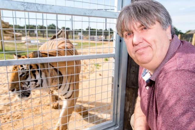 Horncastle News editor, John Fieldhouse, at the tiger enclosure.