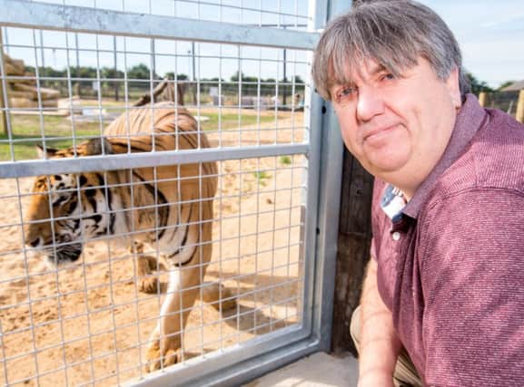 Horncastle News editor, John Fieldhouse, at the tiger enclosure.