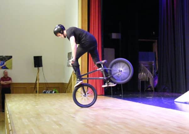 World class BMX rider Joe Sproat in action at St George's Academy. EMN-170307-125229001