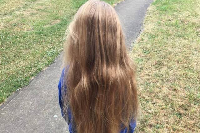 Elizabeth-Grace Wing of, 7, of Sleaford will have her lovely long hair cropped short for the Little Princess Trust. EMN-170627-161248001