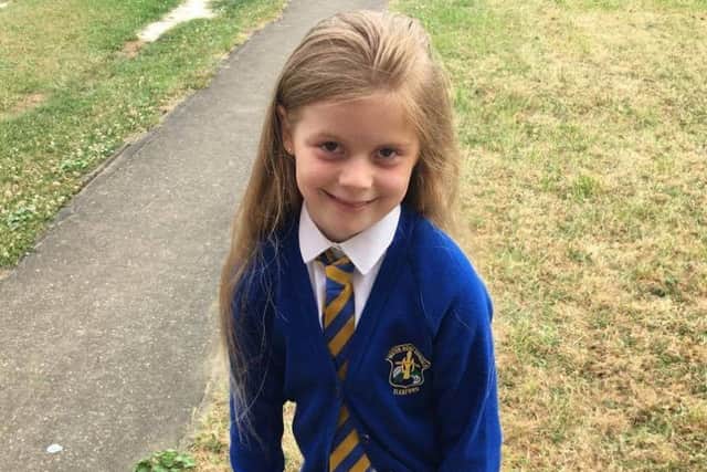 Sleaford Roman Catholic School pupil Elizabeth-Grace Wing is seeking sponsors as well as donating her hair to the Little Princess Trust. EMN-170627-161300001