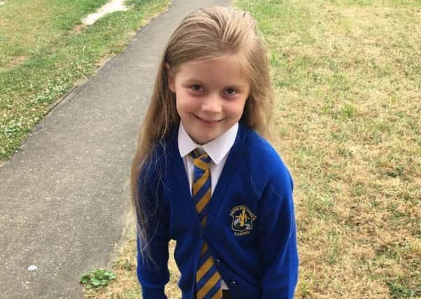 Sleaford Roman Catholic School pupil Elizabeth-Grace Wing is seeking sponsors as well as donating her hair to the Little Princess Trust. EMN-170627-161300001
