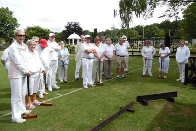 Woodhall Spa and Norwich players are pictured before the start of their friendly match.