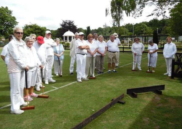 Woodhall Spa and Norwich players are pictured before the start of their friendly match.