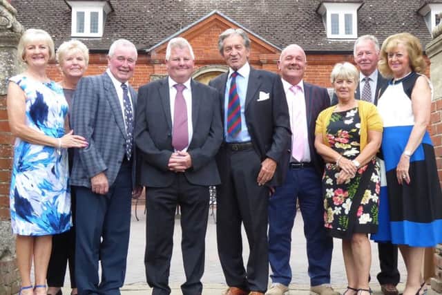 TV actor Patrick Mower (middle) helps out at the Lady Taverners Charity competition, with, from left, Di Everitt, Jenny Noble, Tommy Alford, Stuart Kelly, Patrick Mower, Jeff Allen, Polly Pike (Lady Taverners secretary), Colin Sapey, Yvonne Wood (Lady Taverners chairman) EMN-170307-125410002