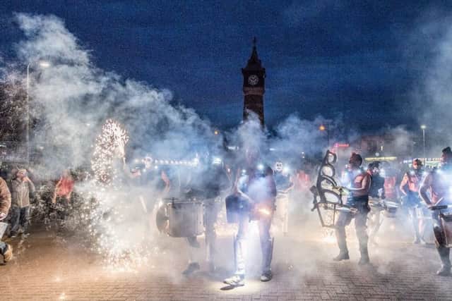 The Clash of the Drums heads towards the Clock Tower in Skegness. ANL-170307-133910001