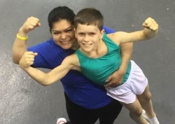 Regional champion Logan Somers with Sleaford Elite head coach Patsy Shields EMN-170307-180614002
