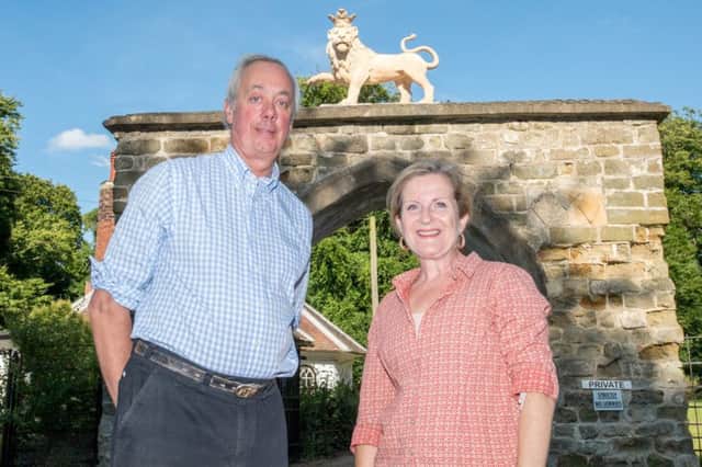 Francis and Jane Dymoke with the Scrivelsby lion.