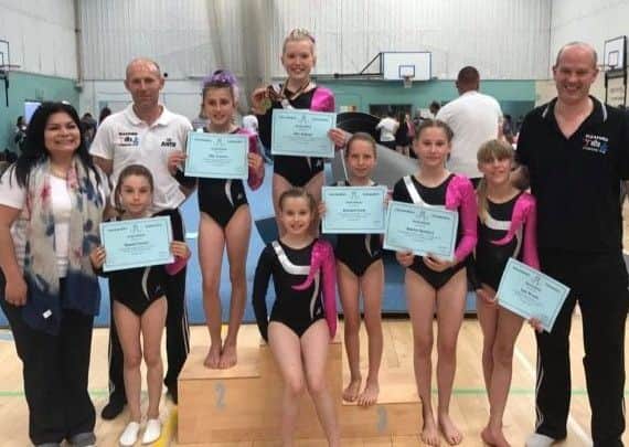 From left - head coach Patsy Shields, Niamh Turner, coach Justin Brown, Elly Conway, Rachel Shields, county champion Alex Boland, Annabel Scott, Amelia Horbury, Izzy Woods, squad coach Edward Shields EMN-170713-172355002
