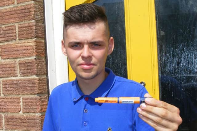 Ryan Paterson of Sleaford and one of the insulin injection pens he vitally needs to keep his diabetes under control.
