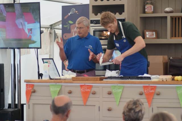 Michael and Ross Davenport from Cotehill Cheese at Osgodby demonstrating at the Lincolnshire Show EMN-171207-092807001