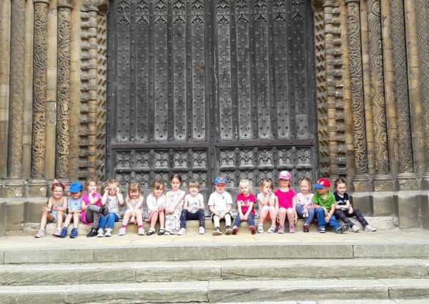 The little leavers at the cathedral's great west door EMN-170717-082834001