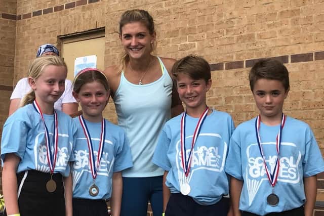 British tennis player Jade Windley with Tealby School silver medallists, from left, Hannah Chapman, Imogen Jenkins, Reuben Herridge, and George Emmerson EMN-170713-120204002