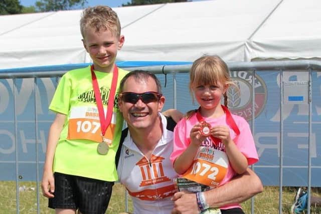 Sleaford Triathlon Club family Joseph and Issie Thorpe with dad Paul EMN-170713-162526002