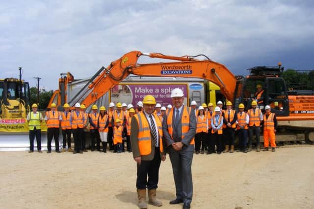 NKDC and Lindum Construction staff mark the start of work on building a new depot for the district's waste collection service, with Lindum Construction MD Simon Gregory (left) and NKDC Leader Coun Richard Wright. EMN-170713-172235001
