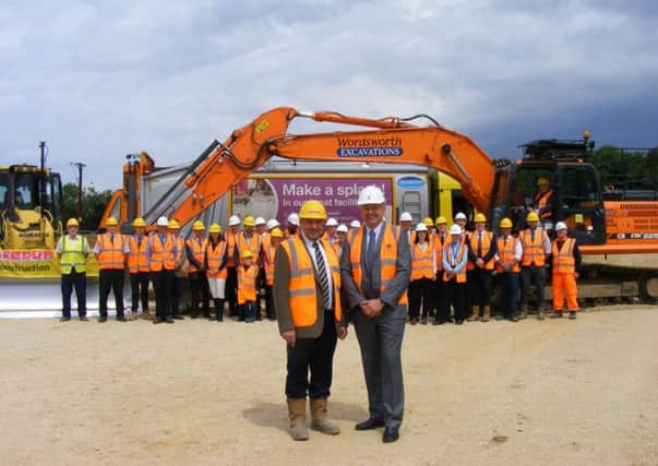 NKDC and Lindum Construction staff mark the start of work on building a new depot for the district's waste collection service, with Lindum Construction MD Simon Gregory (left) and NKDC Leader Coun Richard Wright. EMN-170713-172235001