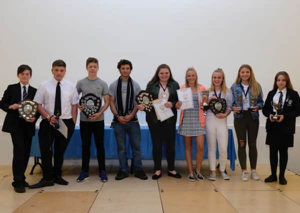 Some of the award-winning sports students with bike ace Guy Martin EMN-170718-172150001