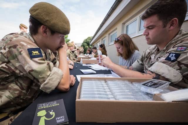 German based UK troops sign up to Donor Register in the hope of finding a match to save a colleague. Photo: Dominic King EMN-170718-092422001