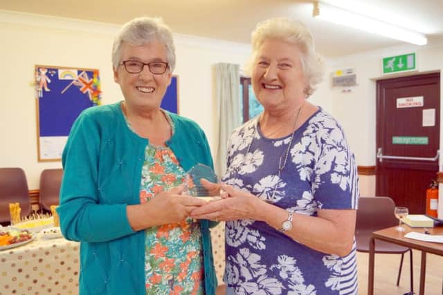May Bennett receiving her award from Joyce Rhodes EMN-170718-105021001