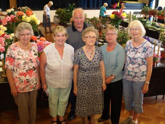 David Fairburn and fellow committee members at last years flower show at Monks Dyke Tennyson College.