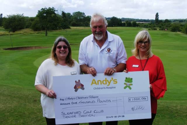 Sleaford Golf Club's 2016 Seniors Captain Clive Boyfield with St Andrew's Children's Hospice Sleaford charity shop manager Deborah Homer (left) and hospice representative Alison Lark (right). EMN-170728-161856001