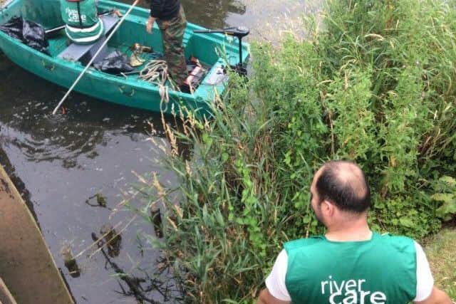 Clean up on the River Slea. EMN-170725-125957001