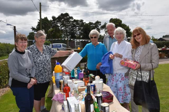 Fun on the tombola at Stainfield Fete EMN-170408-091054001