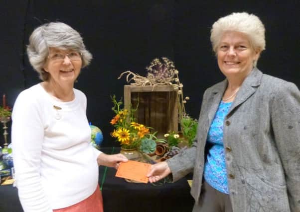 Winner of 'Time Stands Still' Jean Threlfall (left) and Judge Jane Walden.   (Photo by Linda Oxley) EMN-170208-112530001