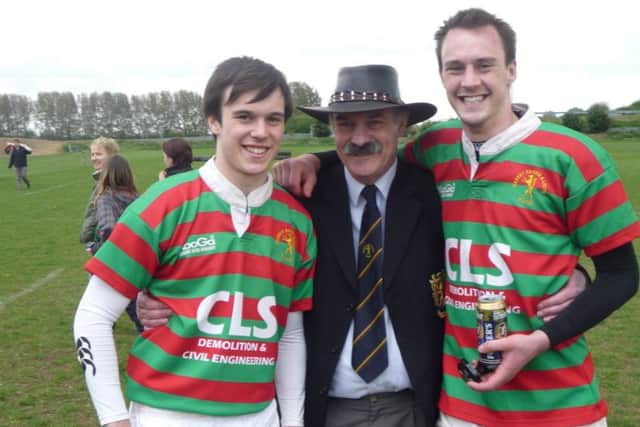 Steve with sons Chris (left) and Peter after the 2009 county cup final win EMN-170731-081711002