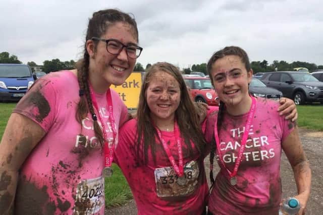 Pretty Muddy 5k finishers, from left, Phoenix, Lily, Willow EMN-170731-094617002