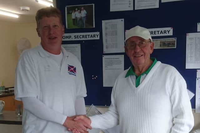 Winners Roy Crampton and Dennis Galvin with organiser Kath Manley.